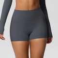 Dettaglio dei pantaloncini da yoga a vita alta grigio scuro con cuciture piatte e tessuto - S / Grigio Grafite