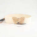 Elastic cream white belt featuring a detailed golden hollow butterfly buckle closure - Beige