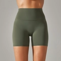 Close-up of olive green high-waisted yoga shorts with seamless double-sided brushed texture - Army Green
