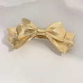 Elegant gold metal bow hair clip featuring a refined brushed texture and layered design - Gold Ribbed Bowknot Clip