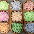 Macro shot of 6x12mm gradient glass bamboo-shaped beads in nine soft pastel colors - Colorful Mix (J110#)