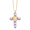 Macro shot of gold cross necklace with purple drop gemstones and Virgin Mary relief - Purple