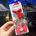 Detailed close-up of 4 Christmas hair clips with plush Santa and yarn bow designs - Style 10