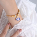 Adjustable gold chain bracelet featuring a purple evil eye charm and crystal accents - E457-Blue Enamel Gold Color Bracelet