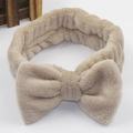 Beige coral fleece headband with a plush bow design for face washing and skincare - Brown