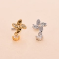 Macro detail of L-shaped nose studs with cross leaf design and micro-set cubic zirconia - Style 11# (Flower)