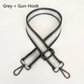 Close-up of adjustable grey and silver striped nylon bag strap with gunmetal hardware - Grey + Gunmetal Hook