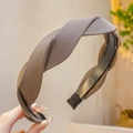 Close-up of brown twist knot headband featuring premium twill fabric texture and design - Light Coffee