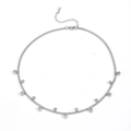 Silver Cuban chain necklace with multiple round clear cubic zirconia pendants on white background - Silver Necklace With Zirconia (T601)