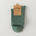Dark green wool blend knit socks with colorful neps texture and craft paper tag - Green