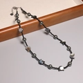 Black tourmaline necklace with grey pearl and cat-shaped mother of pearl on wood tray - XL0097 Grey Pearl with Cat Shell