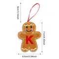 Christmas gingerbread man ornament with red letter K embroidery and size dimensions - Style K