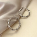 Silver twisted hoop earrings with a textured double-strand spiral design and polished finish - A181 Silver Twisted Hoops