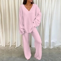 Close-up of pink long-sleeve V-neck top and wide-leg trousers in soft flannel fabric - Pink