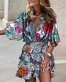 Detailed view of bohemian paisley print dress with batwing sleeves and deep V-neckline - S / Blue Paisley Print