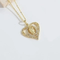 Golden heart medallion necklace with Virgin Mary motif and white zircon accents - White Zircon Heart Virgin Mary