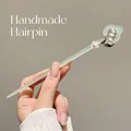 Handmade light green translucent wooden hair stick with white lily of the valley flowers - Yunge Clear Water Style