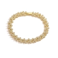 Detail of a gold flower bracelet with crystal micro-pave petals on a white background - Gold Tone White Zircon Bracelet