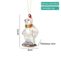 Detail of hand-painted glass polar bear ornament with red scarf and ski poles - White Polar Bear