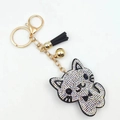 Cute cartoon cat keychain with white rhinestones, golden loop, and black leather tassel - Black Base AB Rhinestone