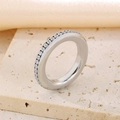 Minimalist silver stainless steel ring featuring a single row of sparkling crystals - Wide Edge Pave Style (KR111406-KFC)