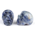 Polished natural sodalite crystal skull carvings in blue and white stone finish - Blue Spot Stone