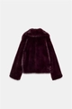 Detail view of plush dark purple faux fur jacket texture and rear silhouette design - XS / Burgundy