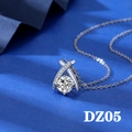 Macro shot of 2ct round zircon pendant on blue fabric with pavé diamond detail - Style DZ05 [2 Carat, No Chain]