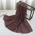 Close-up of a premium chocolate brown pearl chiffon scarf draped on a minimalist display - 175cmx70cm / Purple Coffee