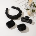 Detail showing plush black headband, matte claw clip and wrist washbands set - Black Headband Wristbands And Square Clip