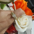 Close-up of gold-plated multi-row zircon ring with oval centerpiece on hand - White Zirconia Oval Open Ring (CR00812CX)