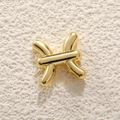 Close-up of golden bubble-style Pisces zodiac pendant with a polished metallic finish - Pisces