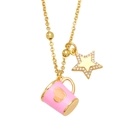 Macro detail of gold necklace with pink enamel heart cup and sparkling star pendants - Pink