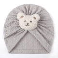 Gray knitted baby turban hat with a cute white plush bear patch for spring comfort - Gray