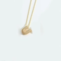 Gold letter U pendant necklace with sparkling pavé crystals on a delicate chain - Letter U