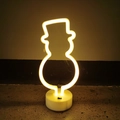 Makroaufnahme einer Schneemann-Neonlampe mit warmgelbem LED-Licht und weißem Sockel - Batterie und USB Dual Use / Warmweiß Schneemann