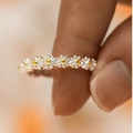 Exquisite silver daisy flower ring with gold center petals shown on finger - Daisy Micro-set Style - Silver