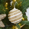 Golden Christmas bauble with white braided ribbon and pearls on Xmas tree branch - Threaded Champagne Foam Ball 8CM