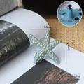 Blue and gold starfish drawer handle knob for cabinets with detailed seashell texture - Starfish Blue Gold