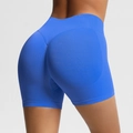 Seamless high-waisted yoga shorts in vibrant blue with a peach lift and ribbed texture - Electric Blue