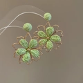 Close-up of bohemian green fabric flower earrings with golden frame and floral studs - 44# 925 Sterling Silver Earring Post-Green-Pleated Metal Flower (HE24970)