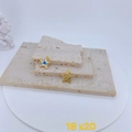 Detailed close-up of two star-shaped gold-plated charms with evil eye and texture - Star Shape / Star Evil Eye