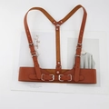 Detail of brown PU leather punk corset belt with adjustable metal buckles on a white background - Camel