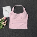 Detail des rosa Halterneck-Sportweste mit seitlicher Streifentextur und nahtlosem Strick - S / Rosa