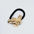 Detailed close-up of golden lava-textured alloy charm on a black high-elastic hair tie - Cross Lava Pattern (Hair Tie 68)