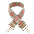 Close-up of pink geometric jacquard bag strap with golden metal lobster clasps - Matcha Green Pink