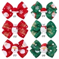 Close-up of assorted Christmas bow hair clips with Santa and Snowman holiday 3D details - Mixed Color Assortment