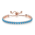 Detail of rose gold adjustable tennis bracelet with oval blue gemstones and slider clasp - Rose Gold + Blue Turquoise