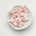 Pink gradient UV plated bear beads in a white ceramic dish for DIY jewelry making - Pink
