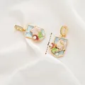 Baroque pearl pendant with blue floral enamel in a 22mm x 16mm golden frame - Style 20 Blue Base Floral Pearl Pendant